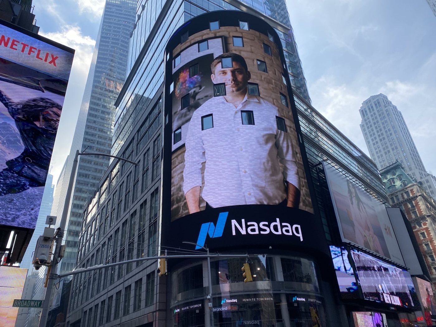 Joseph del Moral on the Nasdaq tower in Times Square